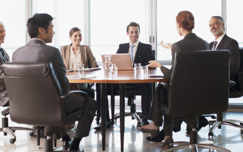 Business people meeting at table in conference room